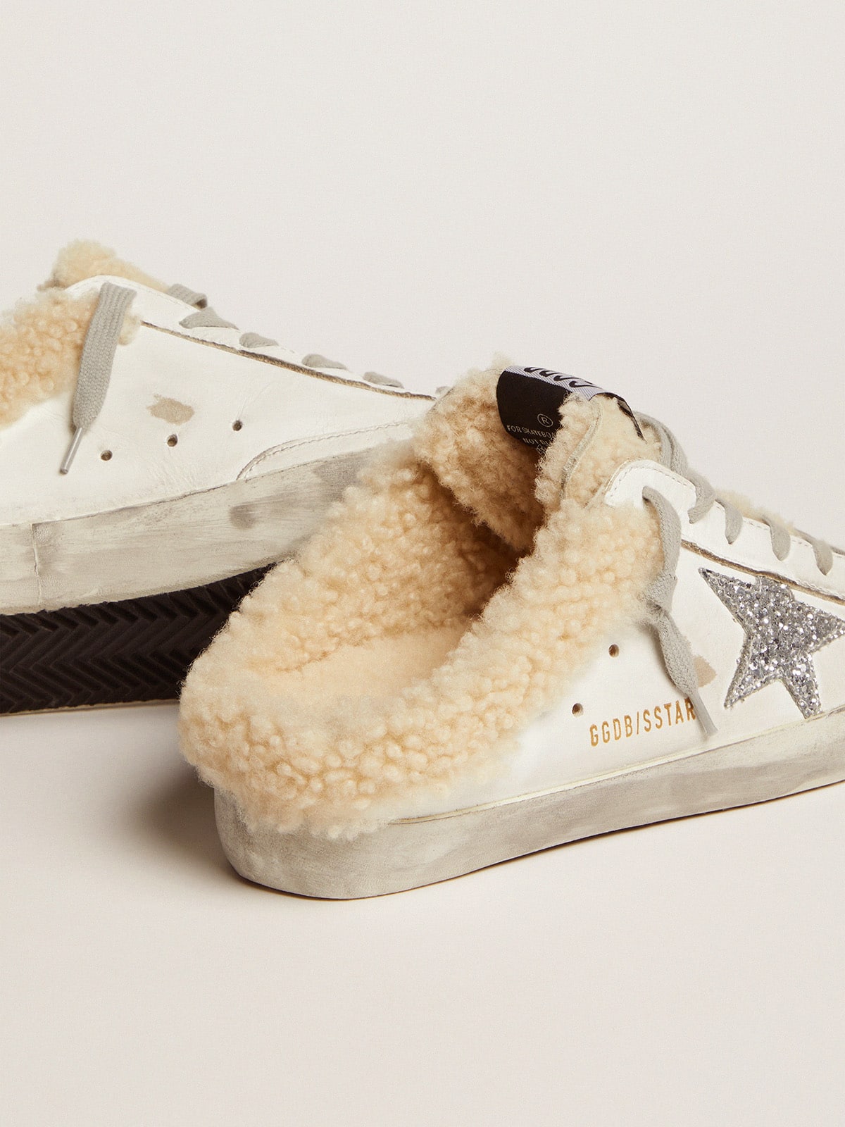 Zueco Super-Star para mujer en piel blanca y forro de borrego