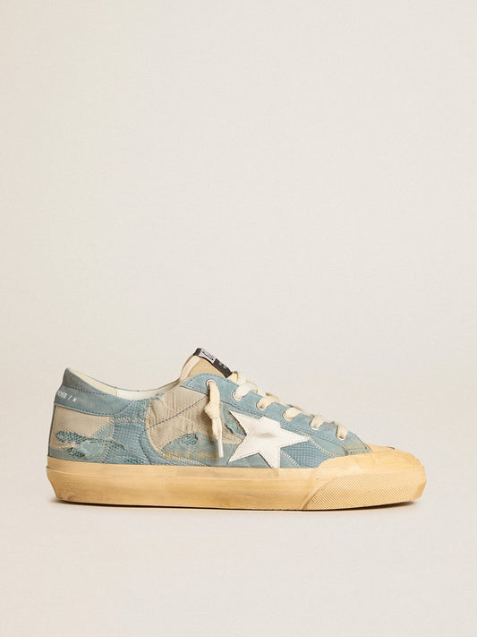 Super-Star en malla y nailon azul claro con estrella de cuero blanca